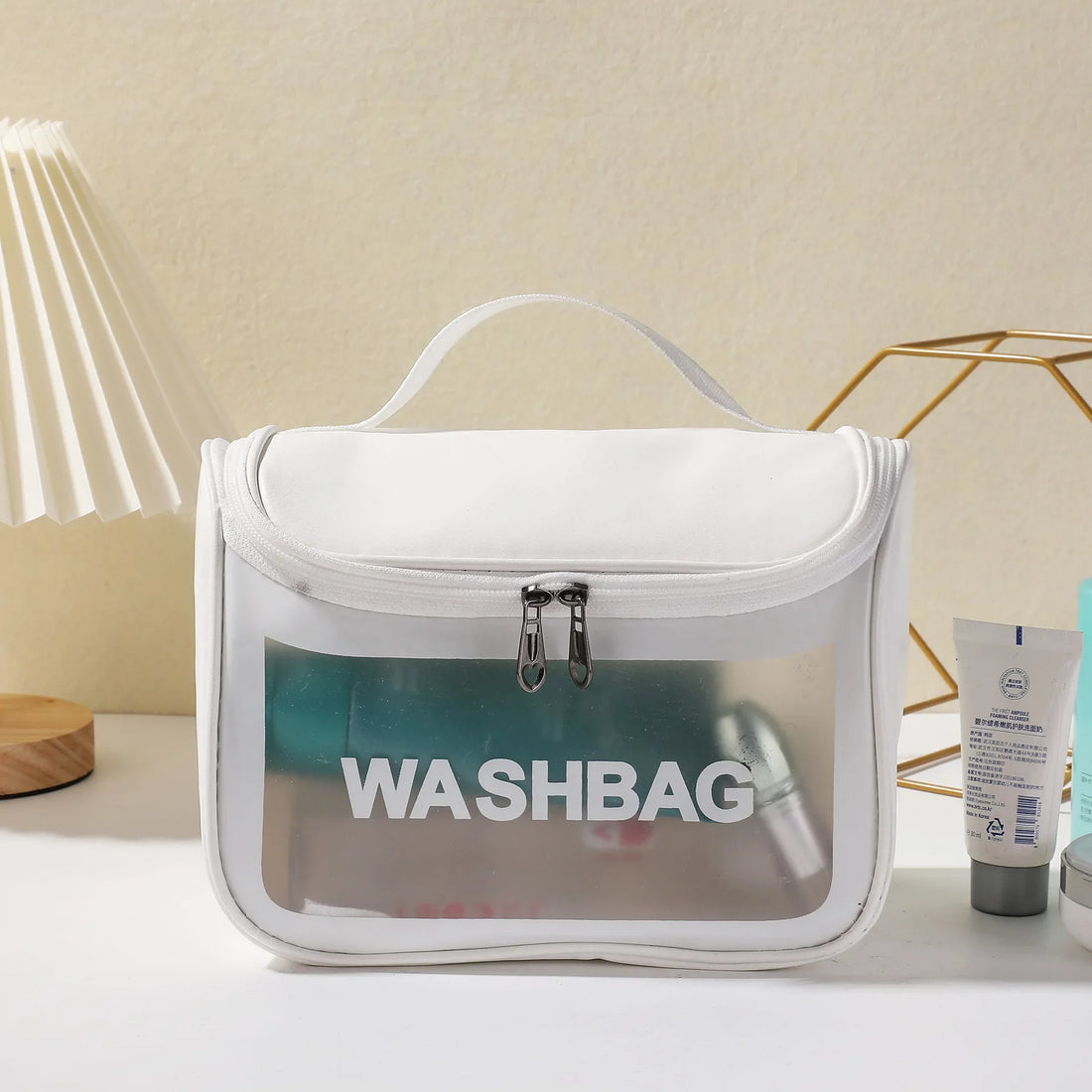 The white frosted washbag on a dressing table
