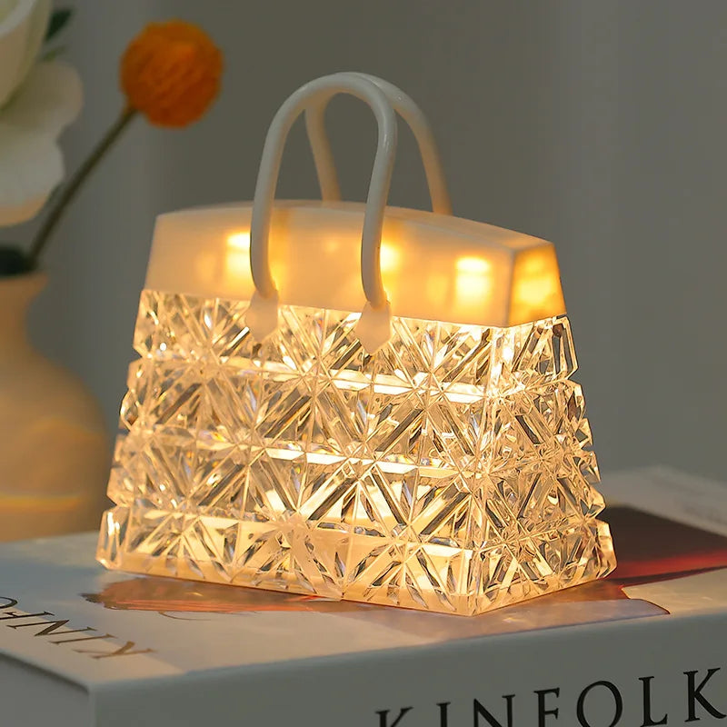 Crystal handbag-shaped LED night lamp glowing warm white