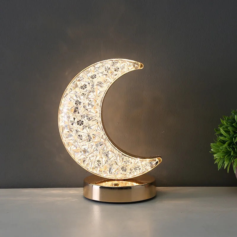 The crystal moon lamp glowing in a dim room