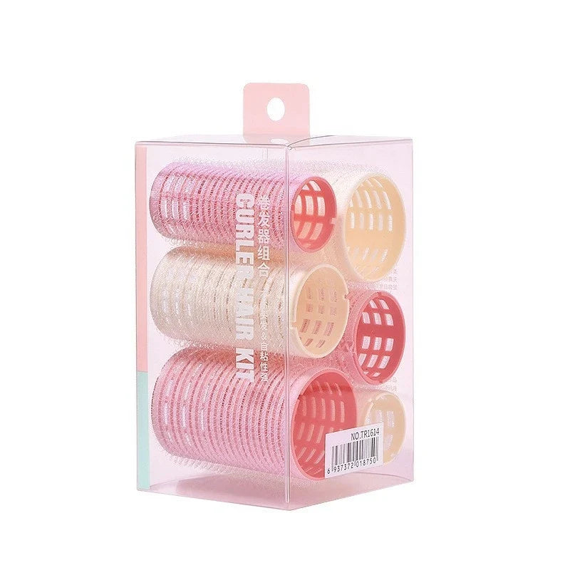 Self-grip hair rollers in a clear box