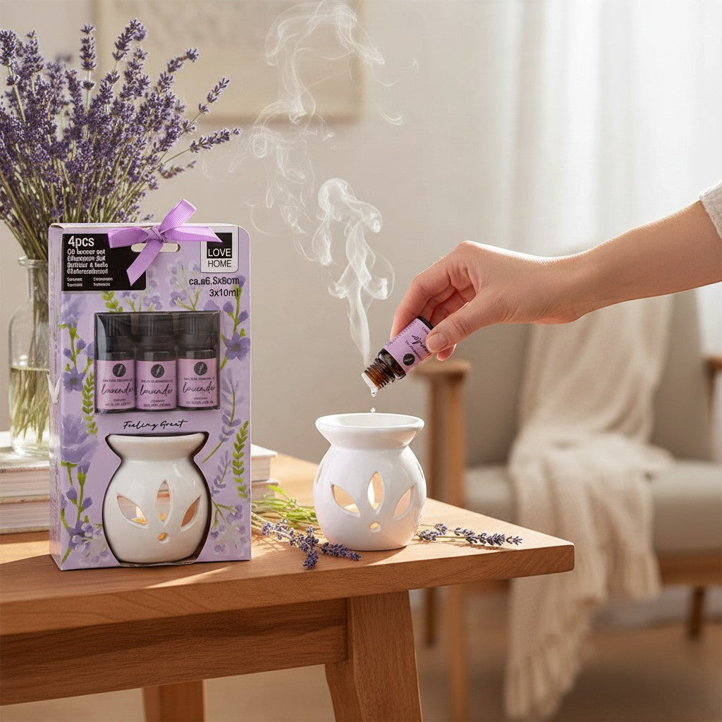 White ceramic oil burner with three bottles of lavender fragrance oil