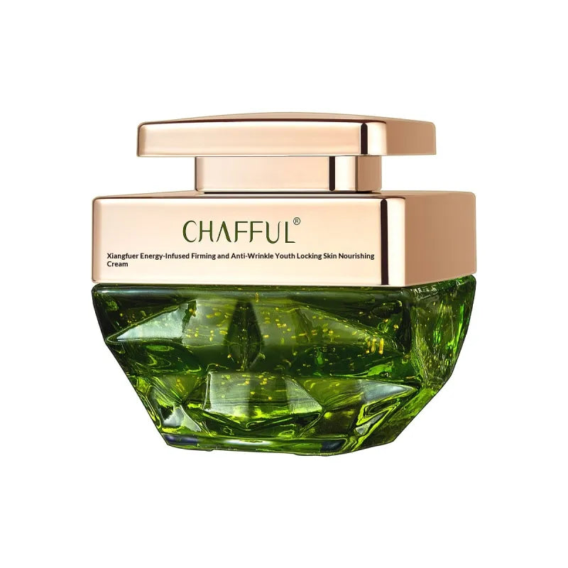 The Chafful face cream in its faceted green glass jar with a rose gold lid.
