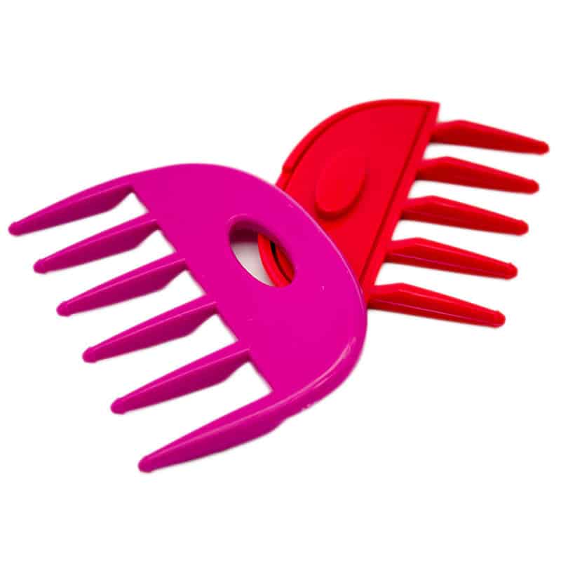 Two scalp massager combs, one pink and one red